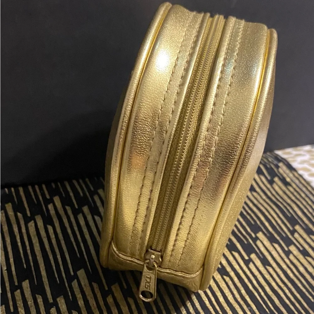 DIOR GOLD ZIPPER POUCH